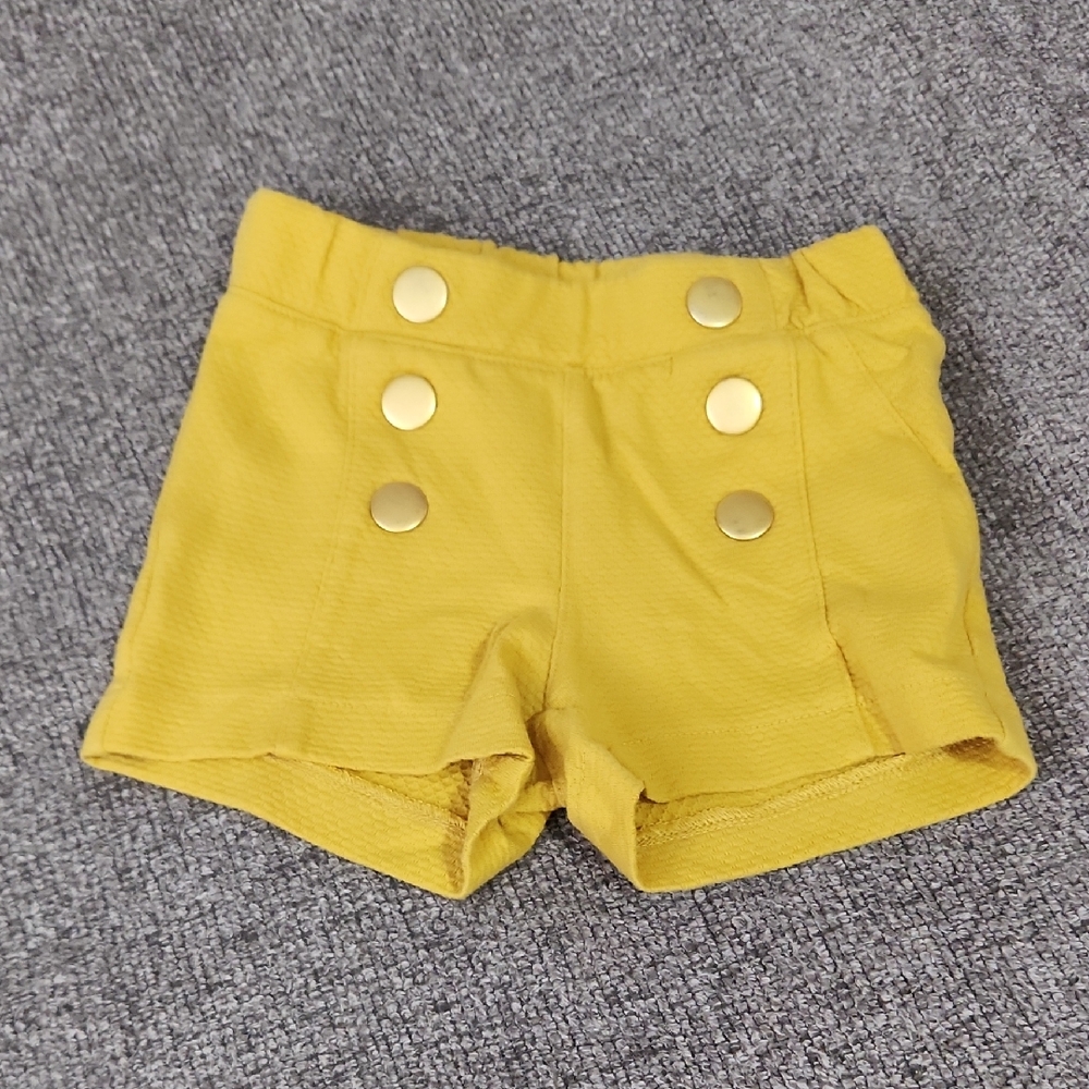 Yellow Shorts with Gold Buttons